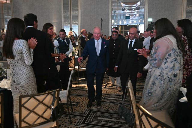 Charles is welcomed to the reception