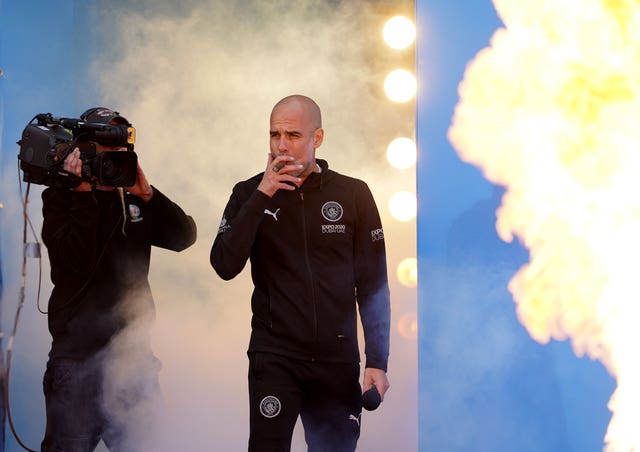 Manchester City manager Pep Guardiola with a cigar