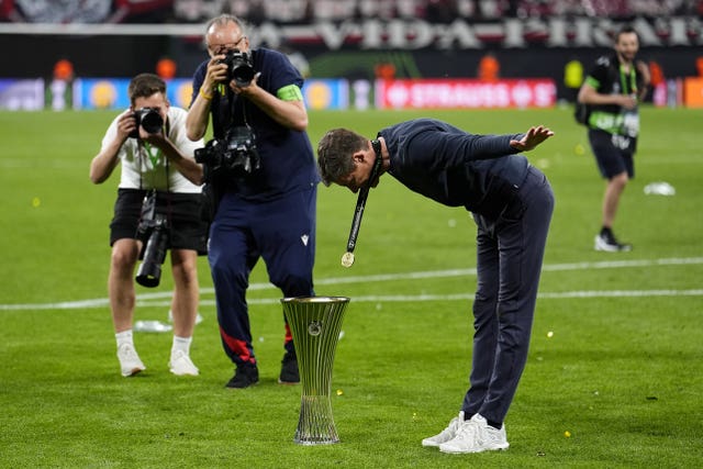 Crystal Palace manager Oliver Glasner celebrates with the UEFA Europa Conference League Trophy