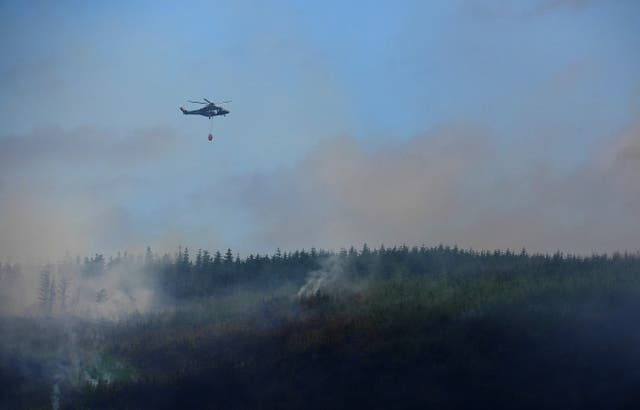 The Irish Air Corps provide aerial support in tackling a major wildfire at Slievenamon in Co Tipperary, on Thursday