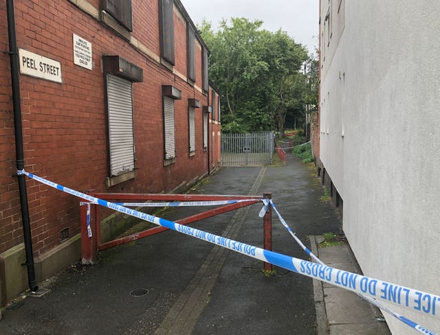 A police cordon in place on Peel Street in Radcliffe