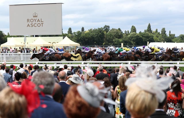 Shades of Blue (left) leads the field during the Queen Mary Stakes