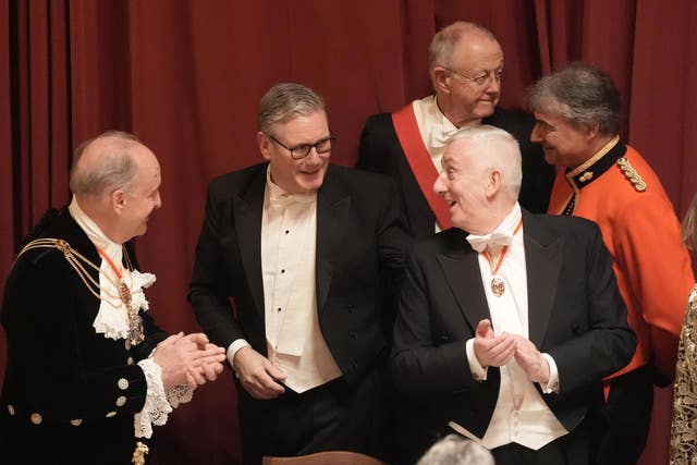 Sir Keir (centre) with Speaker of the House of Commons Sir Lindsay Hoyle (right) during the banquet