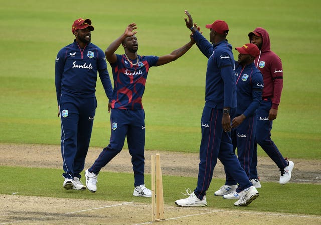 Kemar Roach, second left, will attempt to exploit an England batting line-up light on experience (Gareth Copley/PA)