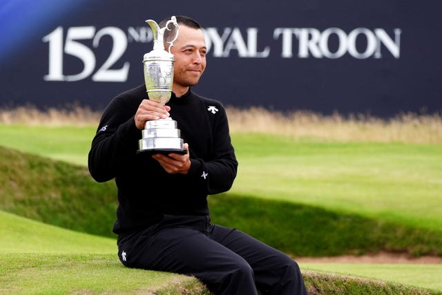Xander Schauffele with the Claret Jug