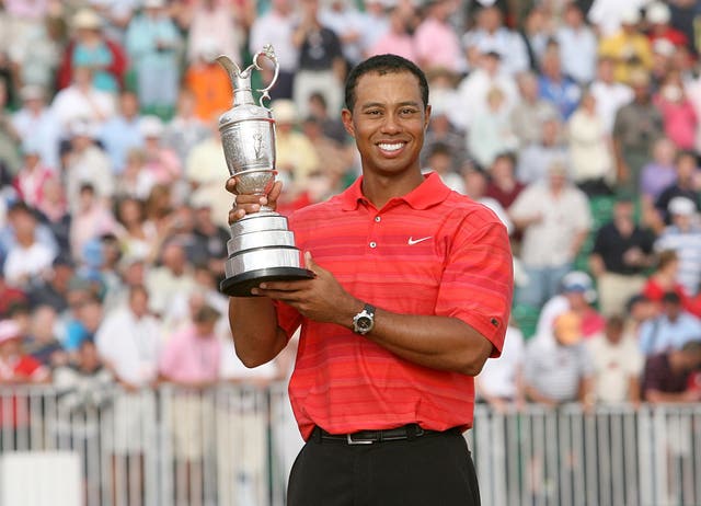 Open Champion Tiger Woods with the 135th Open Championship trophy in 2006