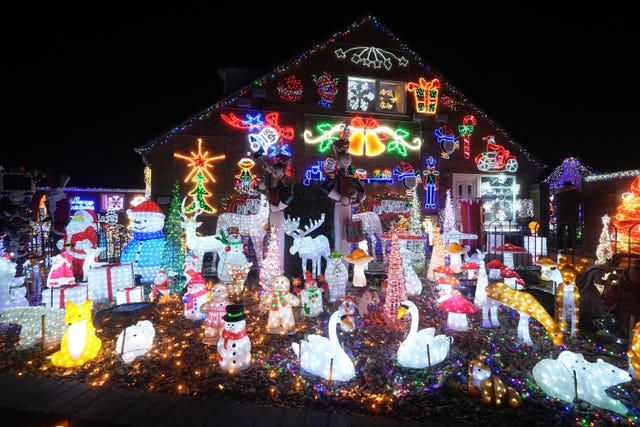 A Christmas light display on the home of Helen and John Attlesey in Soham, Cambridgeshire, who decorate their house every year to raise money for charity