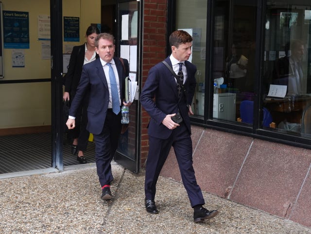 Jockey Oisin Murphy (right) leaving Reading Magistrates’ Court