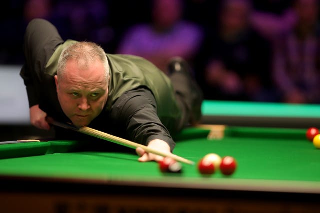 John Higgins enjoyed a straightforward win