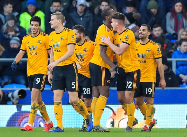 Leander Dendoncker (second right) celebrates scoring Wolves' third goal