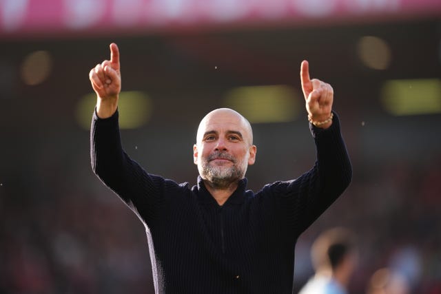 Pep Guardiola celebrates a Manchester City win