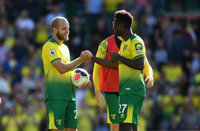 Teemu Pukki, left, scored a hat-trick as Norwich secured their first win since returning to the Premier League