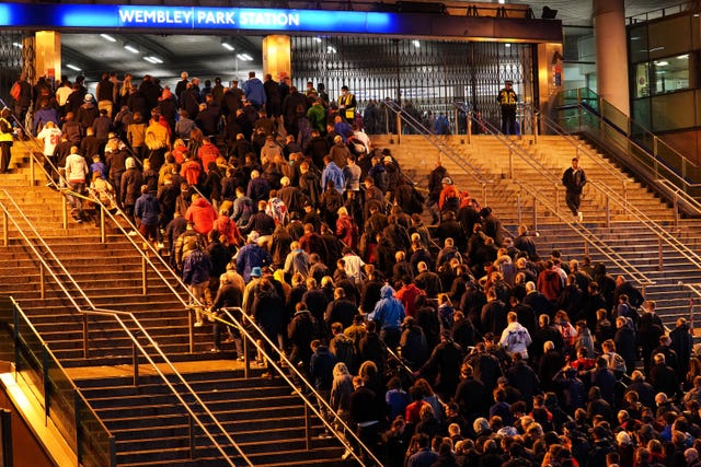 Fans leave Wembley Stadium after the UEFA Euro 2020 Group D match between England and Scotland