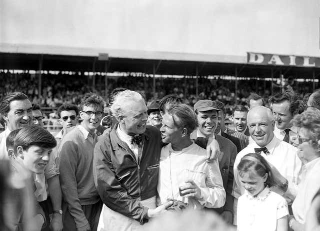 Ferrari driver Peter Collins, right, is congratulated by runner-up Mike Hawthorn after becoming Silverstone's first British winner in 1958, driving at an average speed of 102.05 miles an hour. Compatriot Hawthorn would be the one smiling at the end of the season as he became his country's first world champion