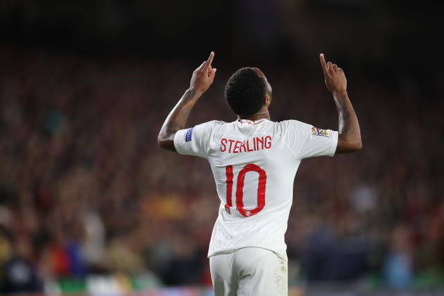 Raheem Sterling celebrates scoring for England against Spain