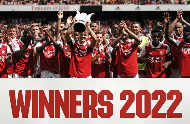 New Arsenal captain Martin Odegaard lifts the Emirates Cup trophy