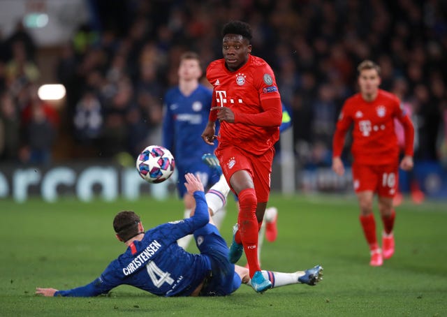 Bayern Munich's Alphonso Davies, right, was born in a refugee camp