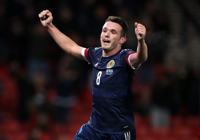 John McGinn celebrates scoring Scotland''s third 