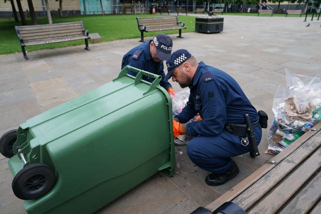 Police officers conduct a search near to Old Eldon Square in Newcastle