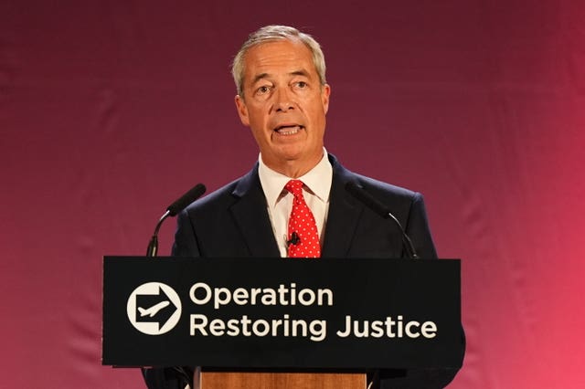 Nigel Farage speaking from a Reform UK lectern