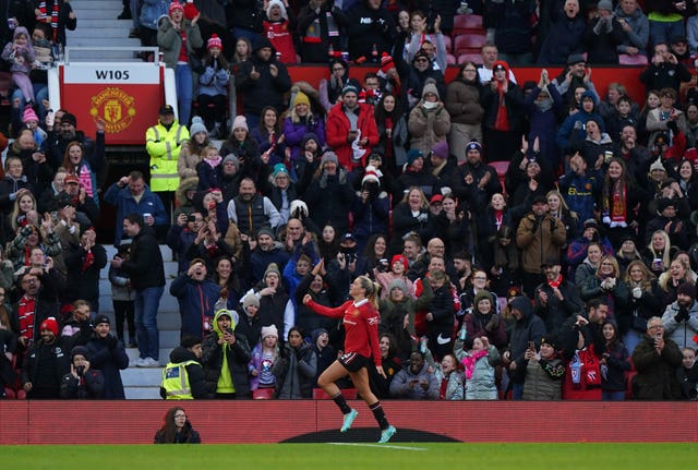 Alessia Russo celebrates scoring United's third