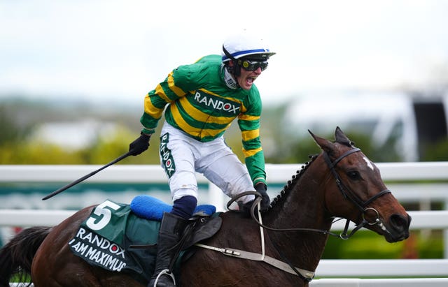Paul Townend celebrates winning the Randox Grand National on I Am Maximus