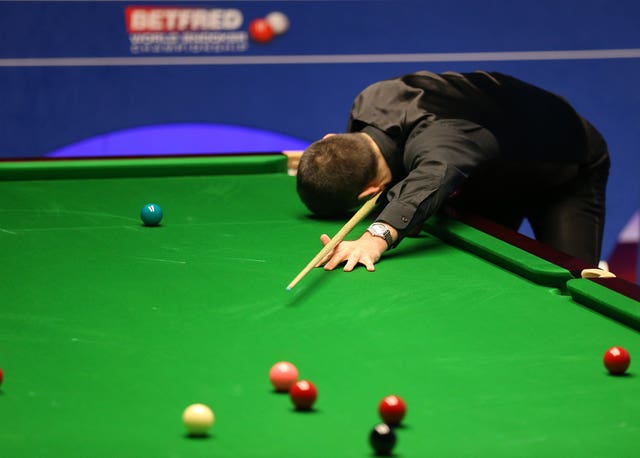 Ronnie O'Sullivan reacts after missing a pot 