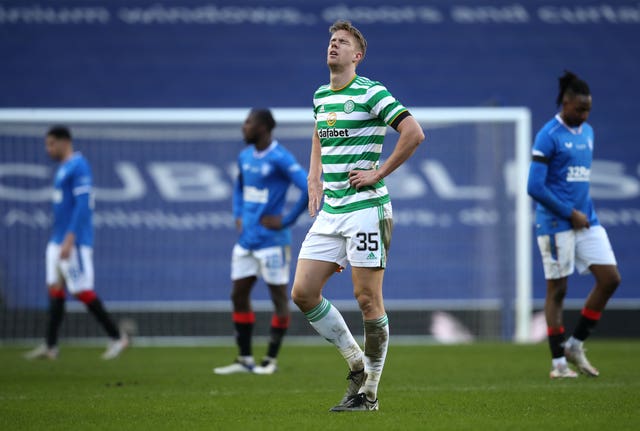 Celtic's Kristoffer Ajer looks dejected after his side's defeat to Rangers on Saturday