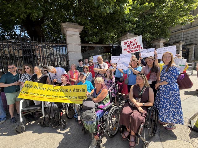 A demonstration outside Leinster House in Dublin to pressure the HSE to approve reimbursement for a drug treating a rare neurological condition