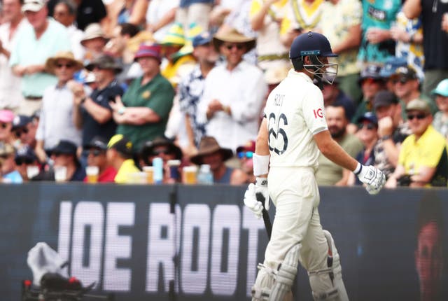 England’s Joe Root walks off after being dismissed during day one of the first Ashes Test in Brisbane