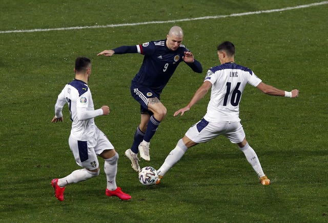 Scotland's Lyndon Dykes (centre) caused Serbia problems