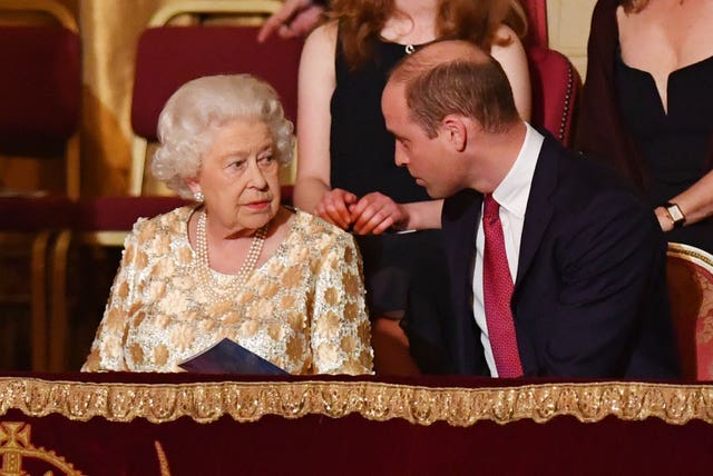 Prince William sat next to his grandmother, with Prince Charles on the other side, and Harry and Meghan sitting close behind (John Stillwell/PA)