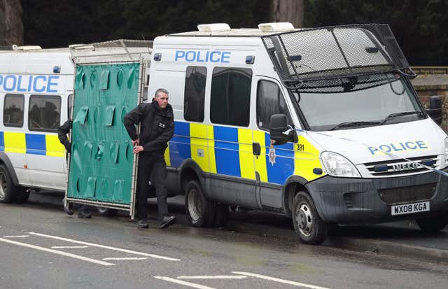 Screens erected outside the London Road cemetery in Salisbury where Sergei Skripal's wife and son were laid to rest (PA)