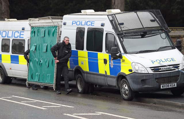 Screens erected outside the London Road cemetery in Salisbury where Sergei Skripal’s wife and son were laid to rest (PA)