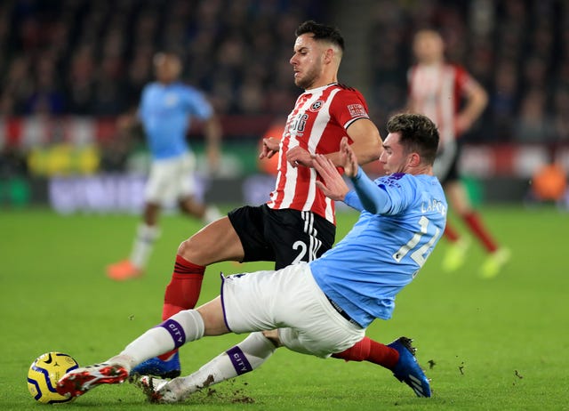 Aymeric Laporte returned for City in midweek