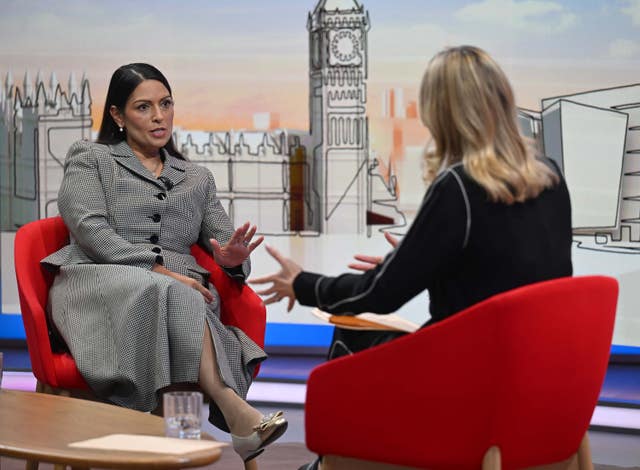 Dame Priti Patel speaking while seated in a TV studio opposite Laura Kuenssberg