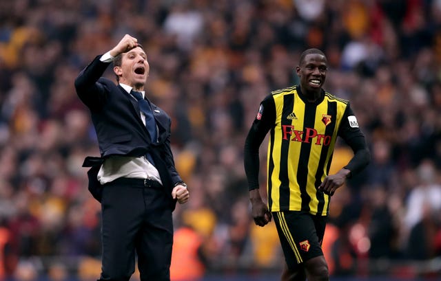 Javi Gracia (centre) and Abdoulaye Doucoure (right)