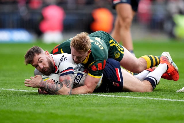 England’s Daryl Clark scores a try