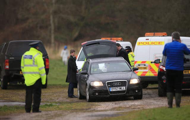 Police at the scene in a field Heywood after the body of a newborn baby was found (Peter Byrne/PA)