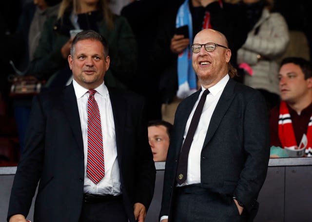 Manchester United co-chairman Avram Glazer (right) pictured at a match at Old Trafford