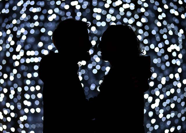 A couple kissing