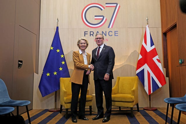 Prime Minister Sir Keir Starmer and European Commission president Ursula von der Leyen shake hands as they meet on the sidelines of the G7 summit in Evian, France