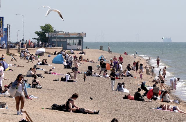 People on the beach in Southend in the sun