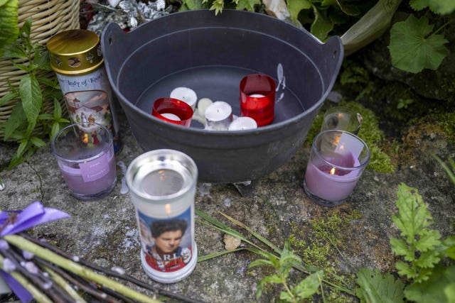 Memorial candles at the site of the former Mother and Baby institution