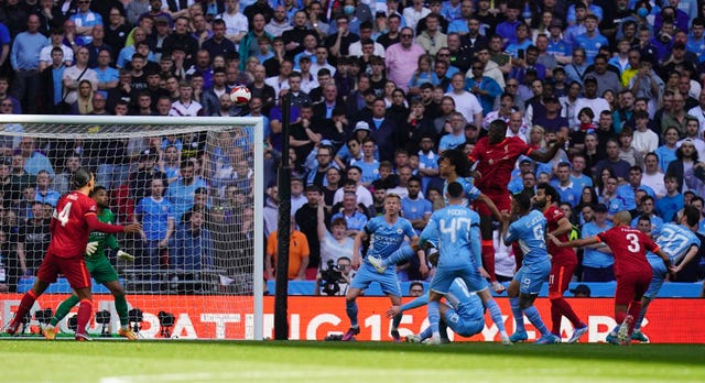 Ibrahima Konate rises high to scored the opener 