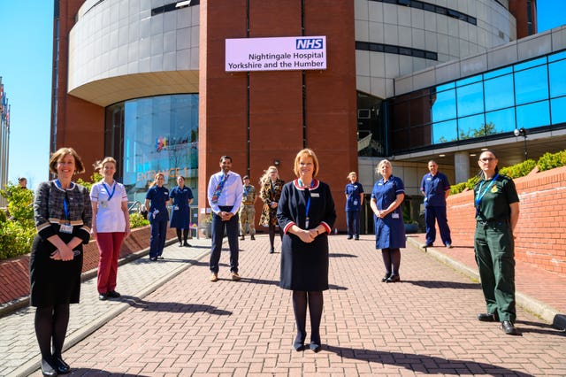 Staff outside the new facility