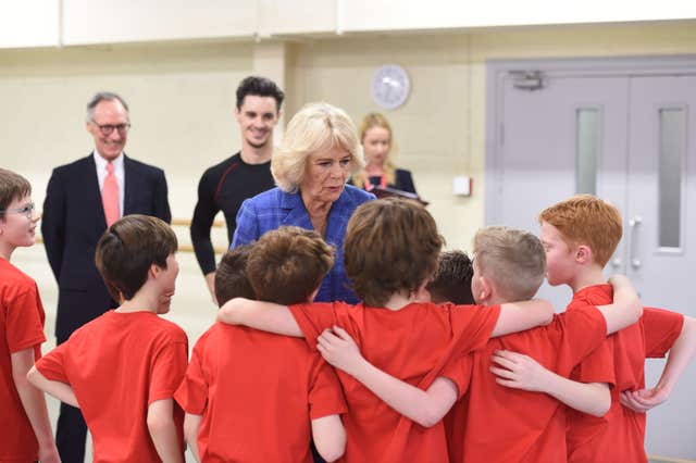 The Duchess of Cornwall chats to boys taking part in the Project B initiative (Eddie Mulholland/Daily Telegraph/PA)