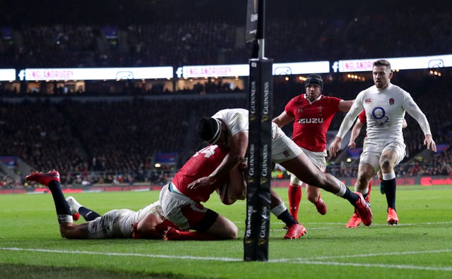 England's Manu Tuilagi (centre) was sent off for a dangerous tackle on Wales wing George North