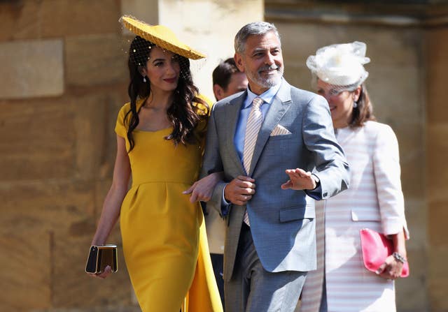 Amal and George Clooney at St George’s Chapel at Windsor Castle for the wedding of Meghan Markle and Prince Harry 