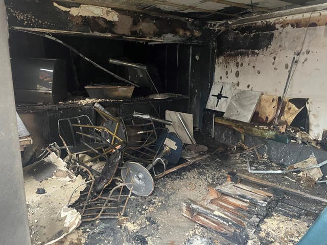 Damage to a cafe in Belfast including burnt furniture